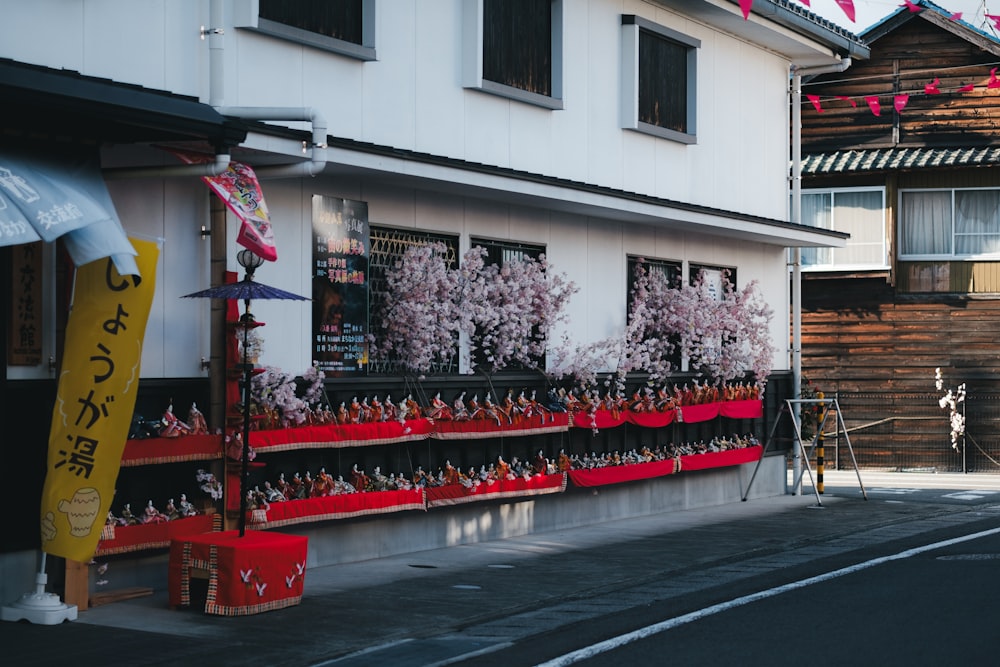 a building with a lot of red and white decorations on it