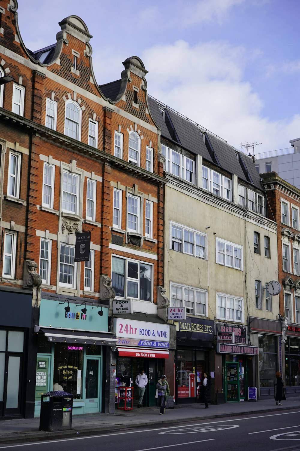 a row of buildings on a city street