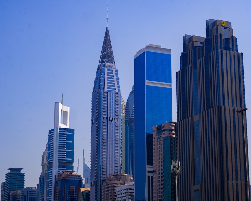 a group of tall buildings in a city