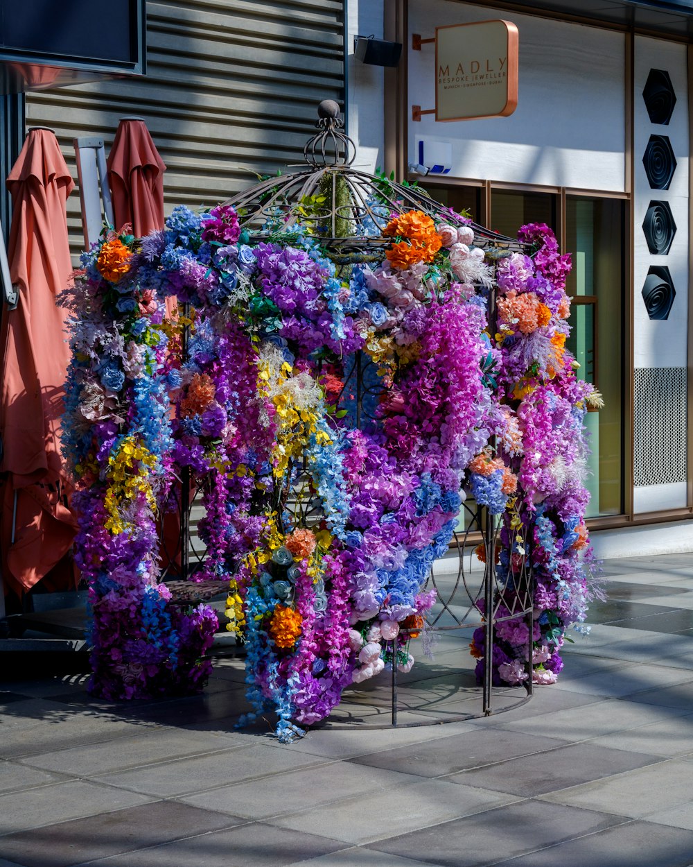 a bunch of flowers that are on a bike