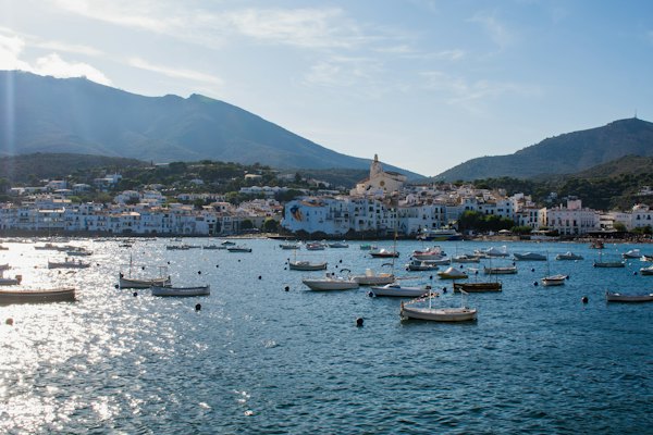 Boats at anchor in the bay below the hills — Cadaqués, Spain