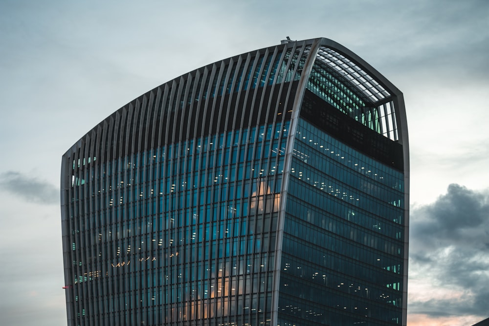 a very tall building with a sky in the background