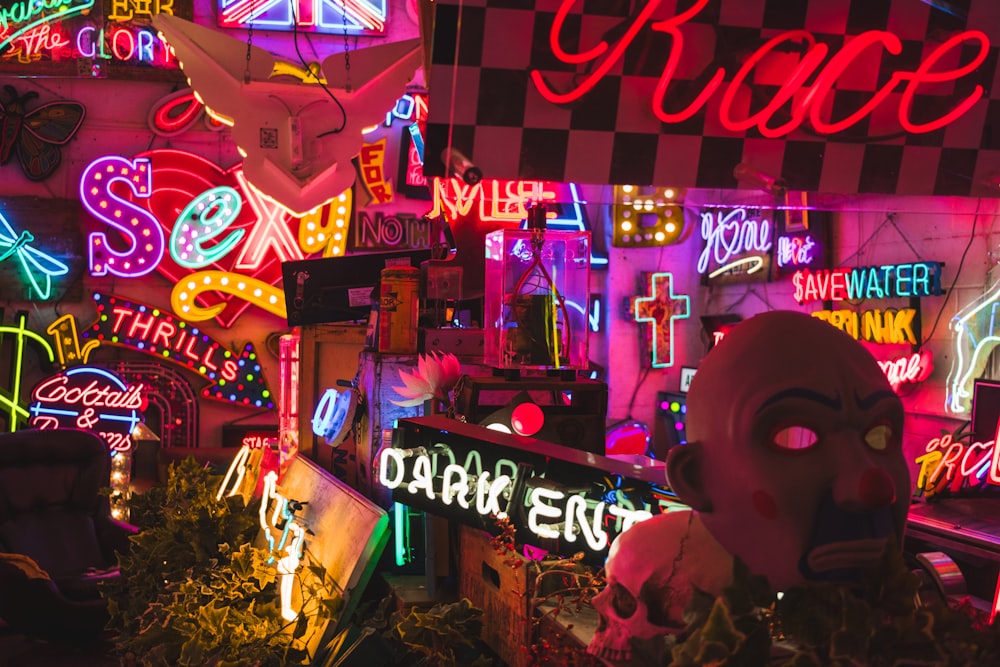 a room filled with neon signs and neon lights