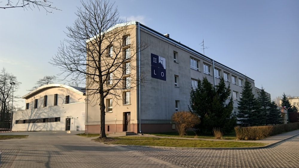 a building with a parking lot in front of it