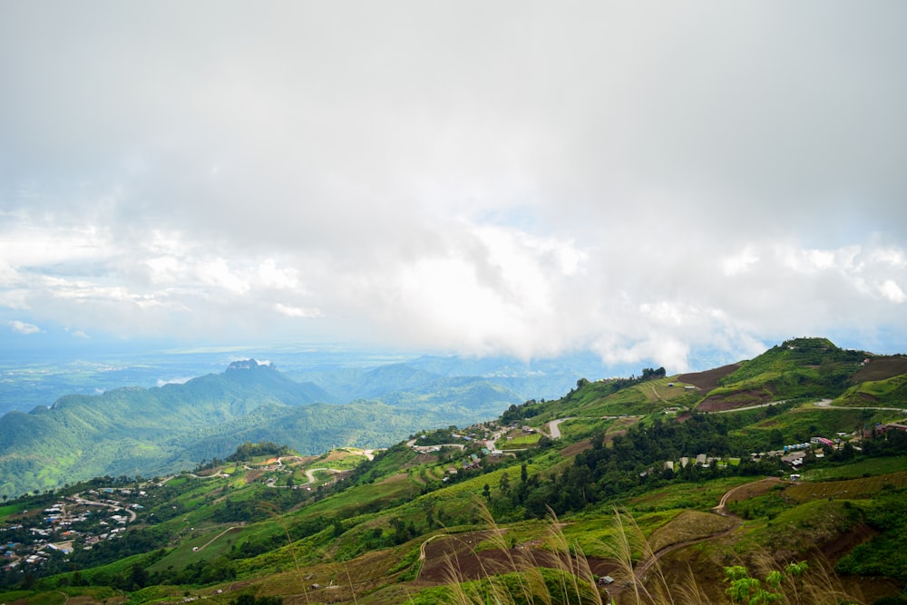 a lush green hillside covered in lush green hills