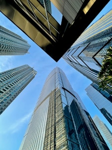 a group of tall buildings towering over a city