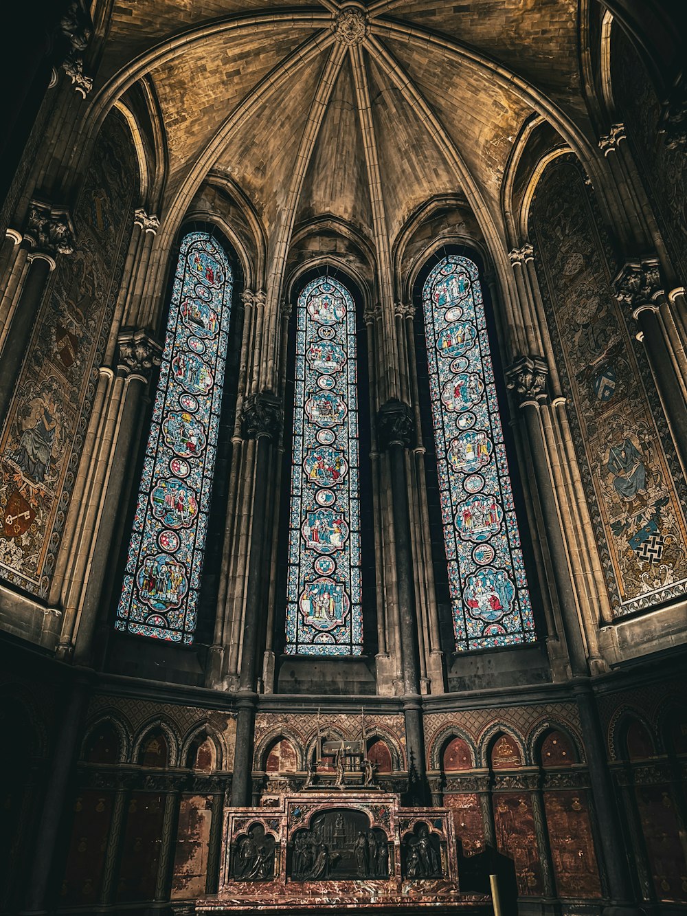 a large cathedral with two stained glass windows