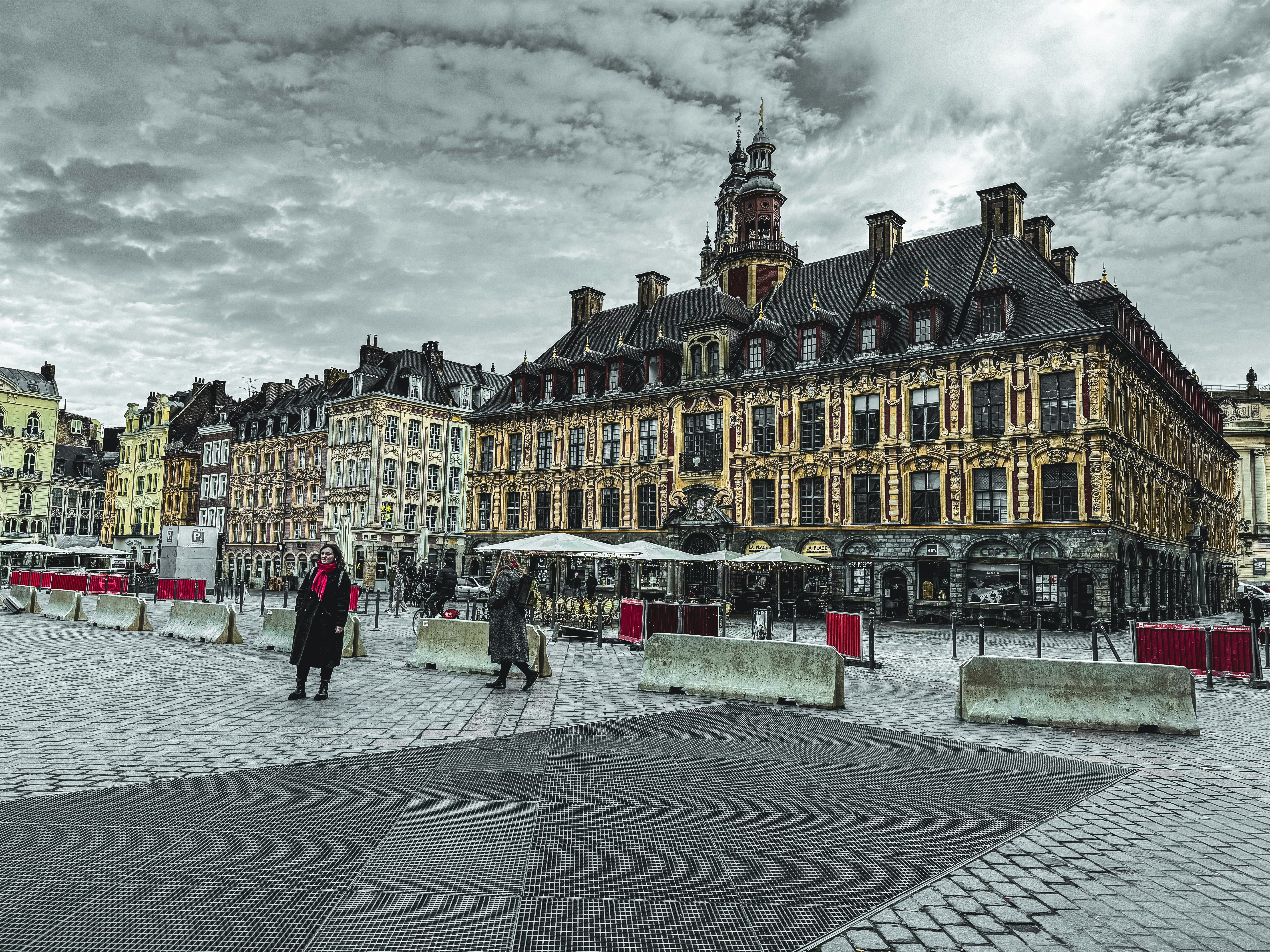 a group of people standing in front of a building