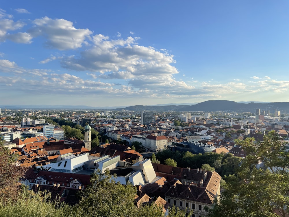 a view of a city from the top of a hill