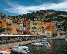 a group of boats floating on top of a body of water
