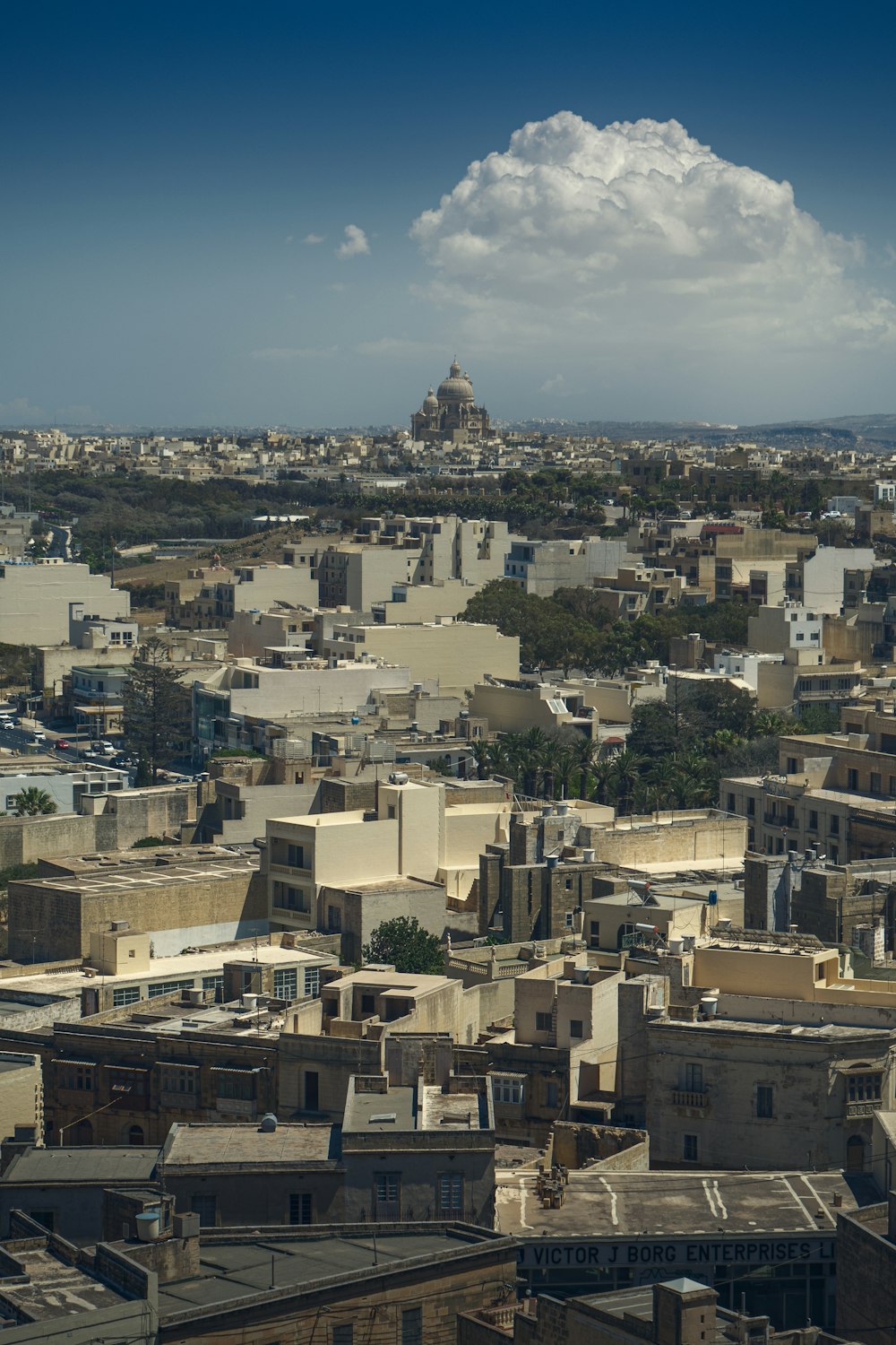 a view of a city from the top of a building