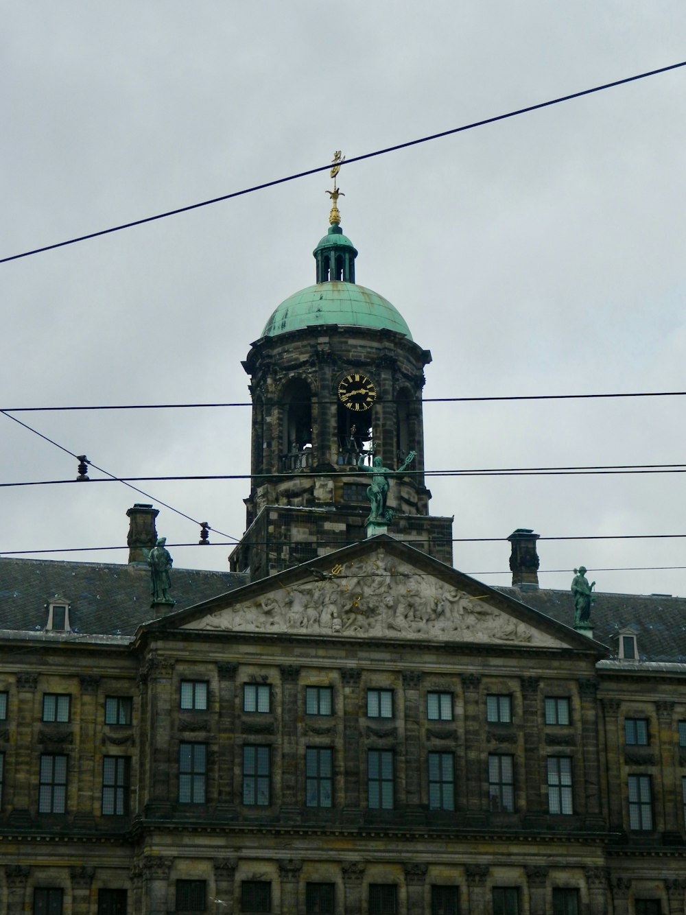 a large building with a clock on the top of it