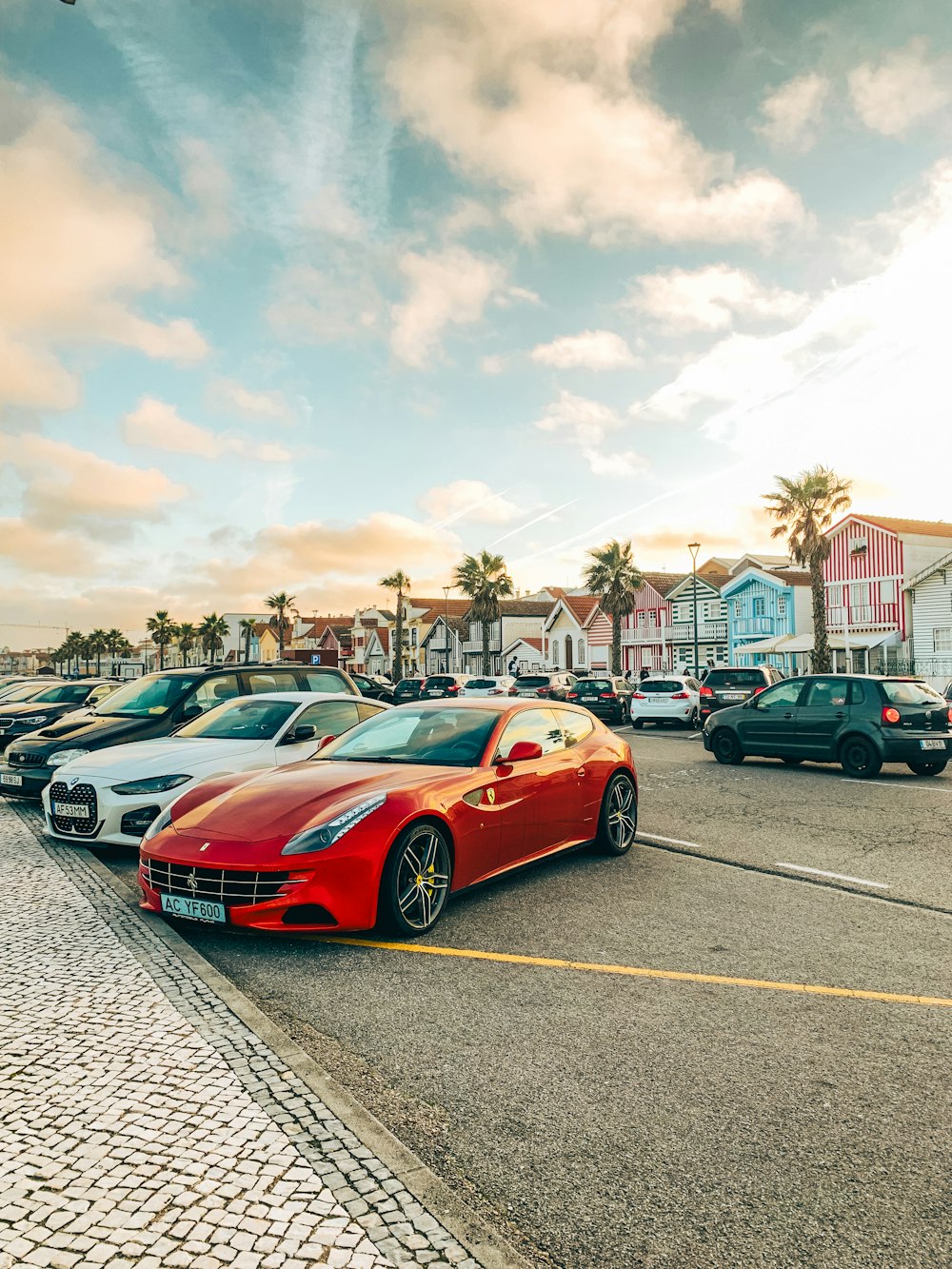 a bunch of cars parked in a parking lot