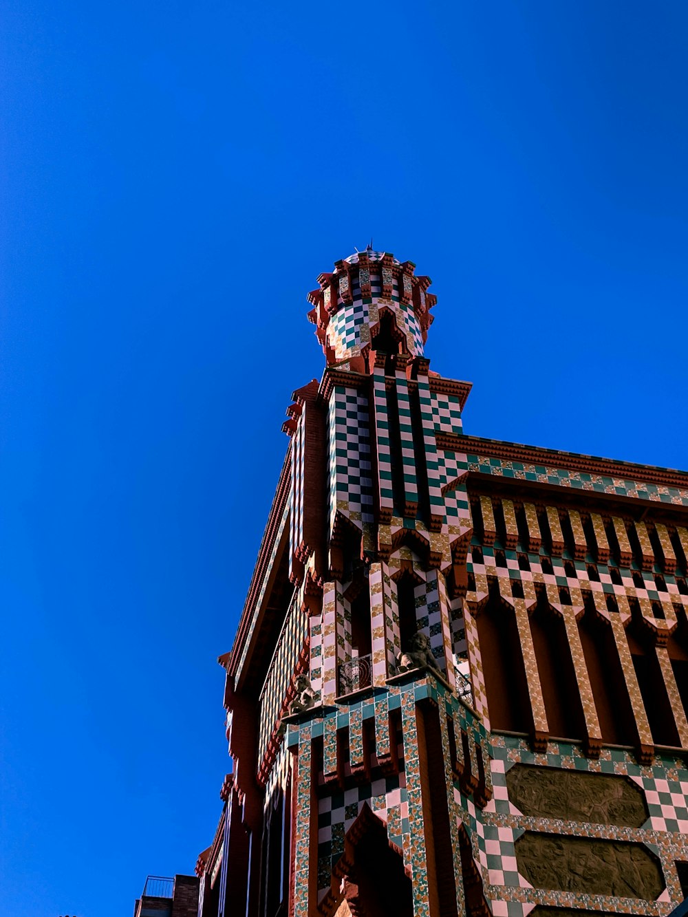 a tall building with a clock on the top of it