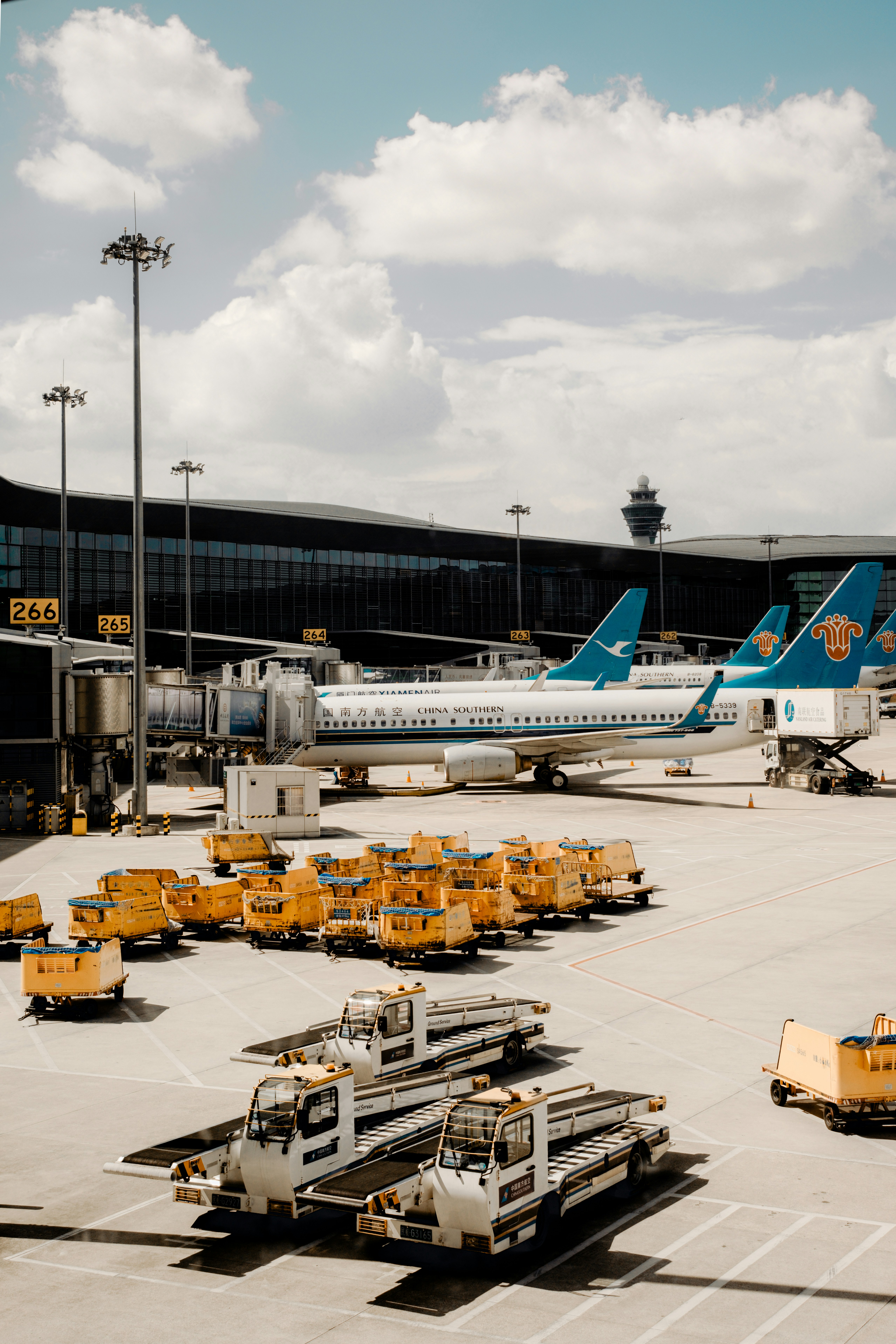 a large jetliner sitting on top of an airport tarmac