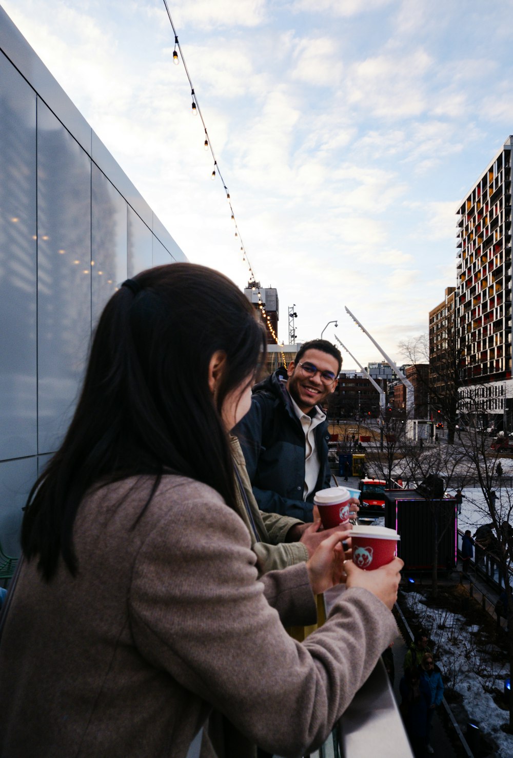 a couple of people that are sitting on a bench