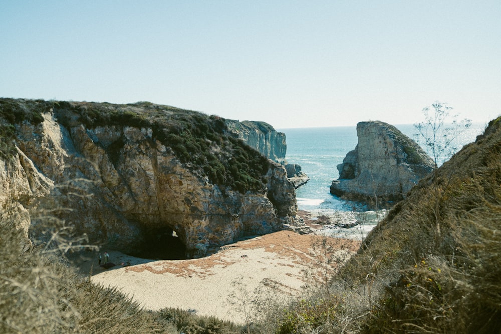 a view of the ocean from the top of a cliff