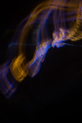 a blurry photo of a blue and yellow object