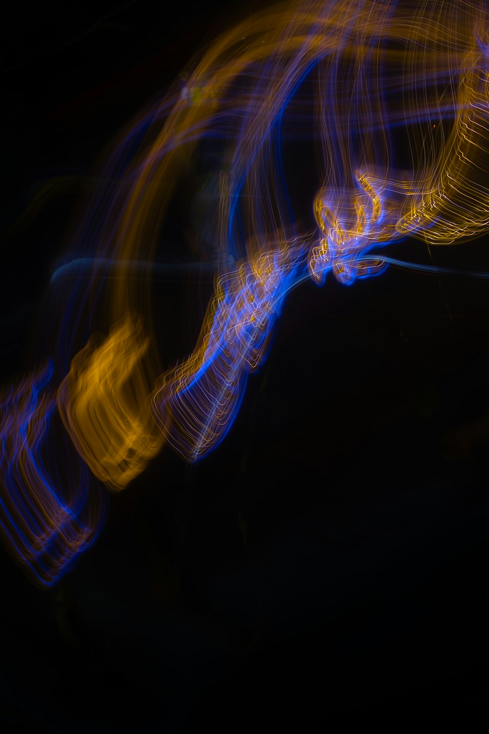 a blurry photo of a blue and yellow object