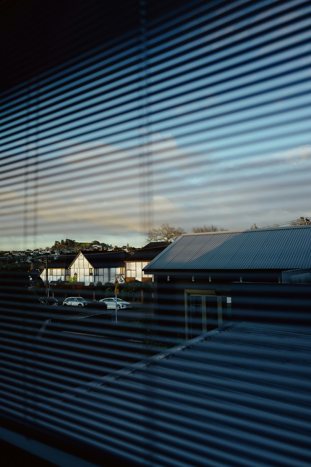 a view of a parking lot through a window