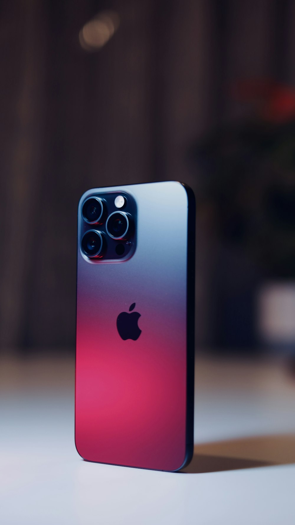 a close up of a cell phone on a table