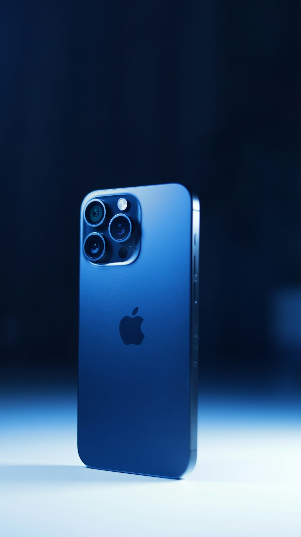 the back of a blue iphone 11
