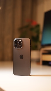 a close up of a cell phone on a table