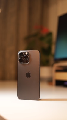 a close up of a cell phone on a table