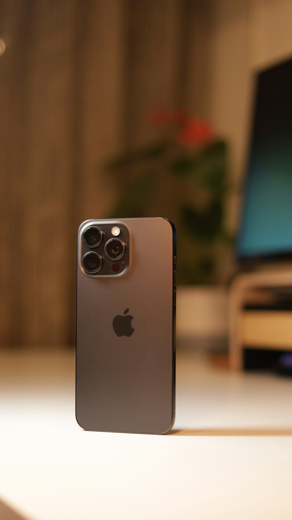 a close up of a cell phone on a table