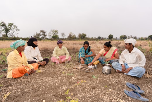 A community group meeting in a field