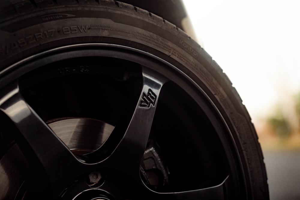 a close up of a tire on a car