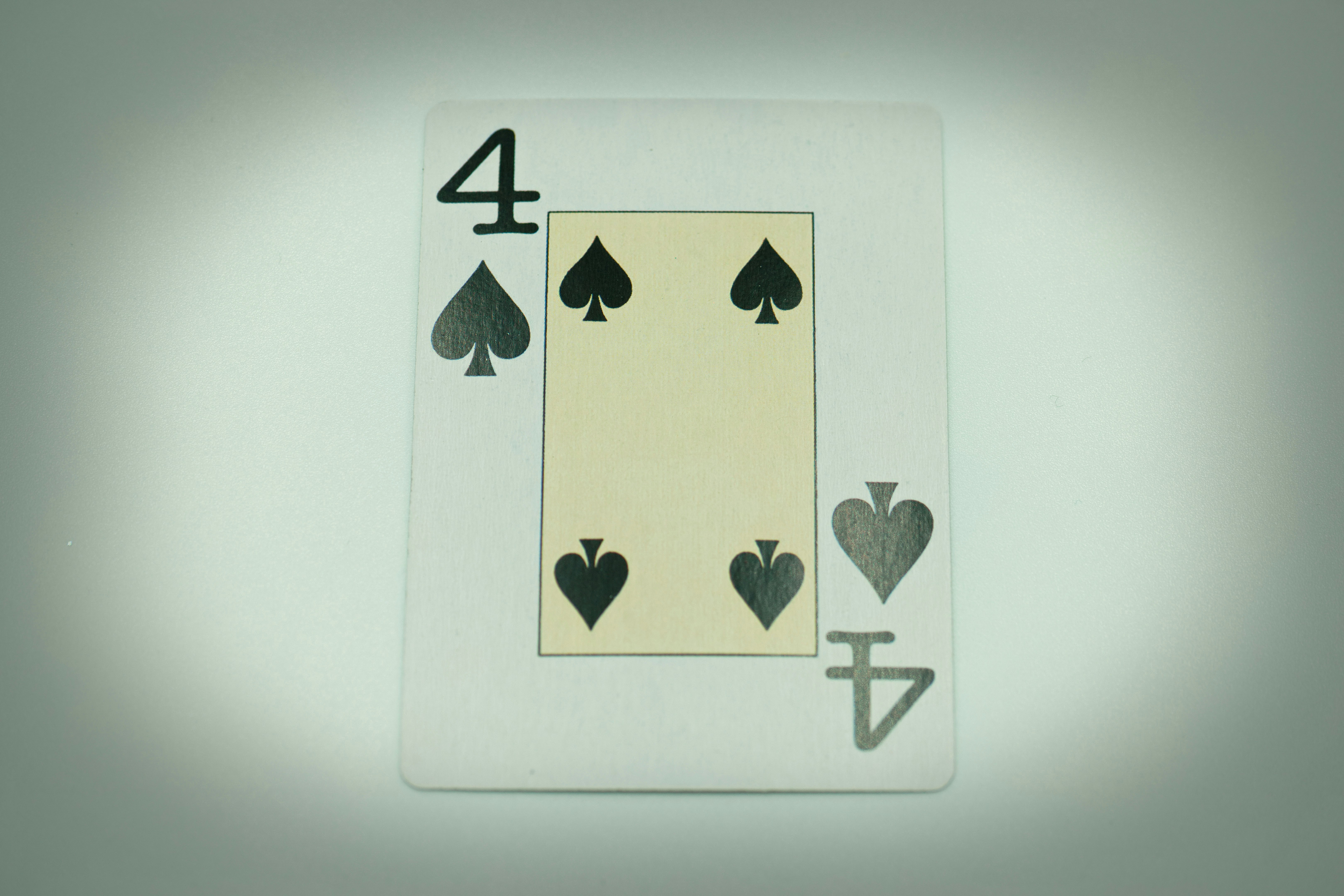 a four of a kind of playing card with four of spades