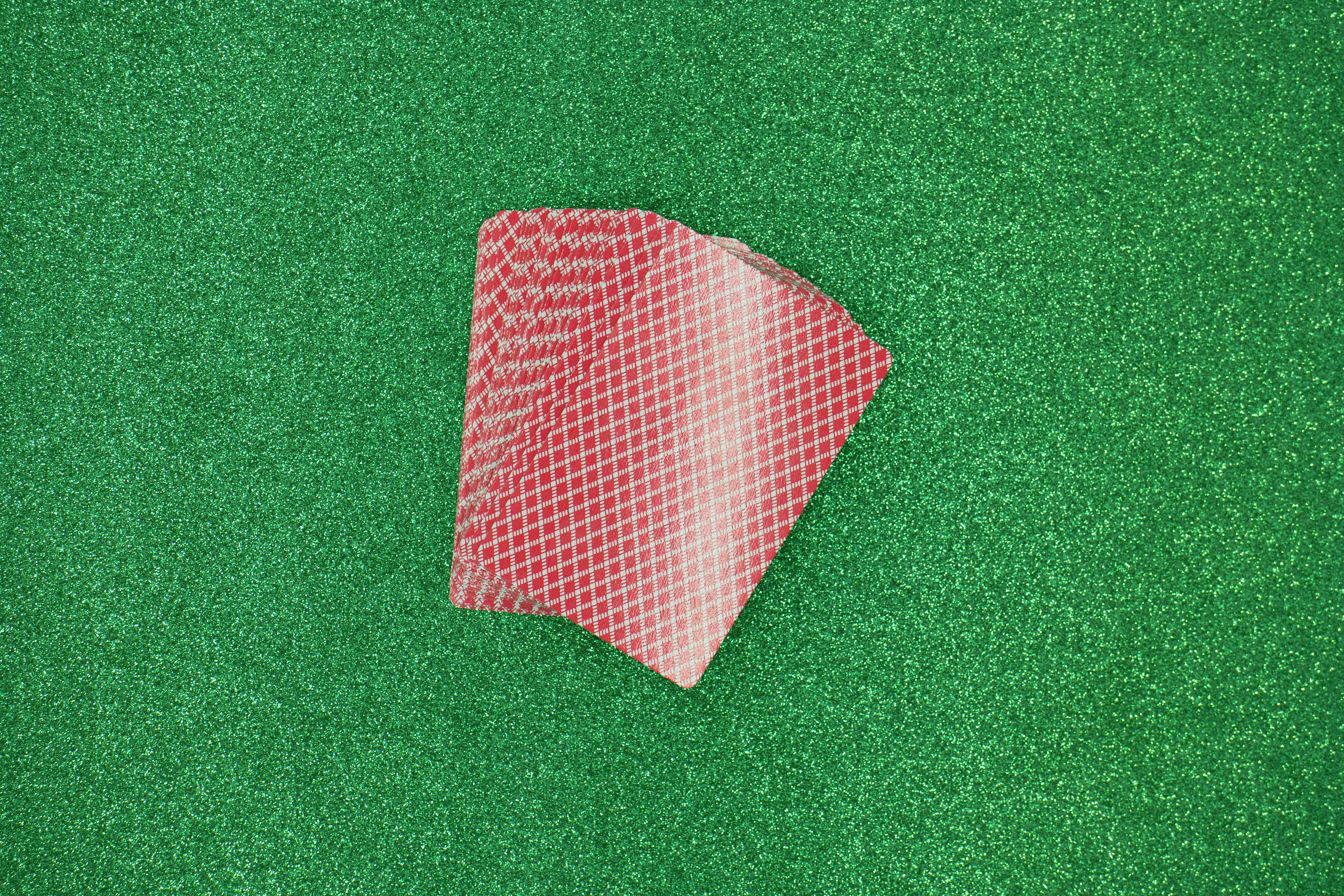 Pickleball player executing precise crosscourt dink with optimal paddle angle and strategic contact point