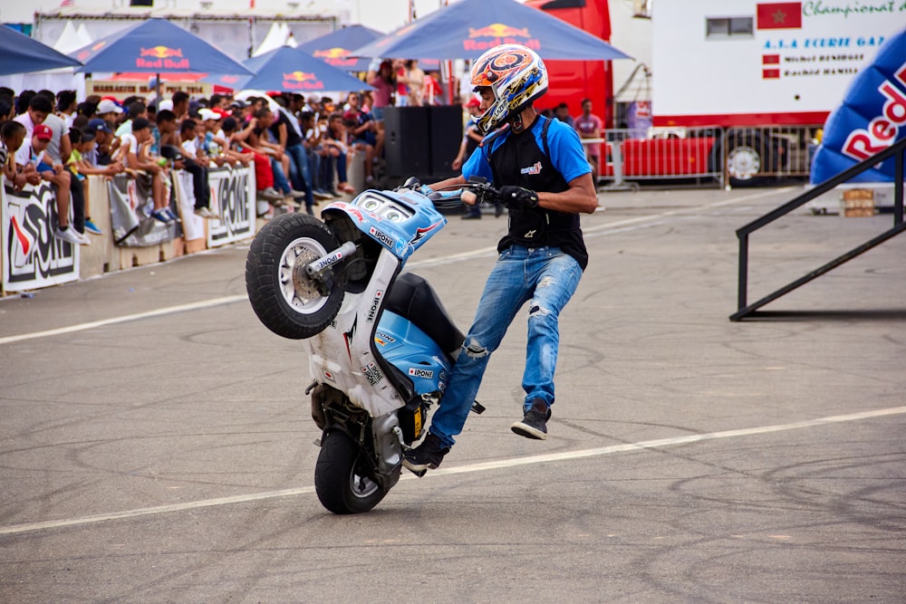 a man riding on the back of a motorcycle