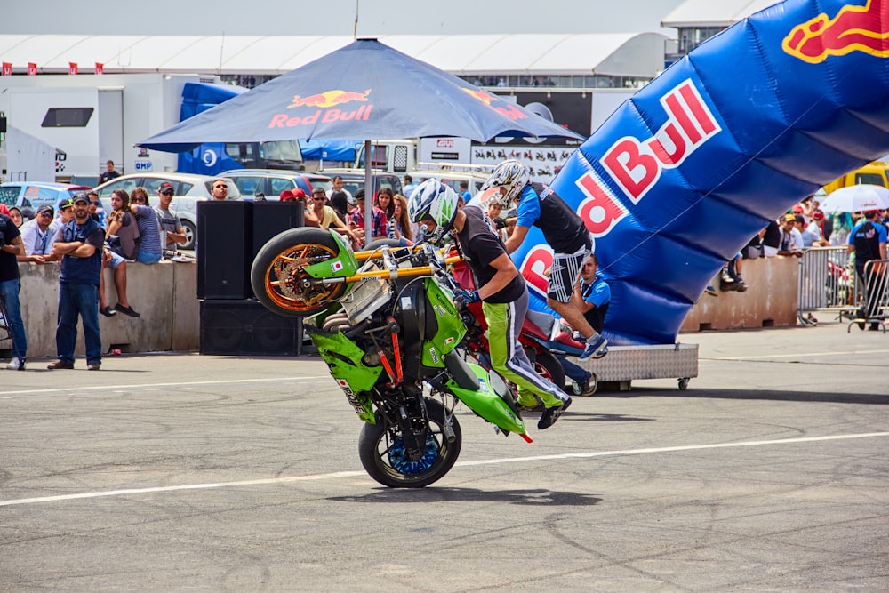 a person on a motorcycle doing a wheelie