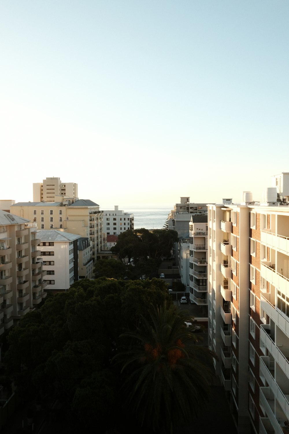 a view of the ocean from a high rise building