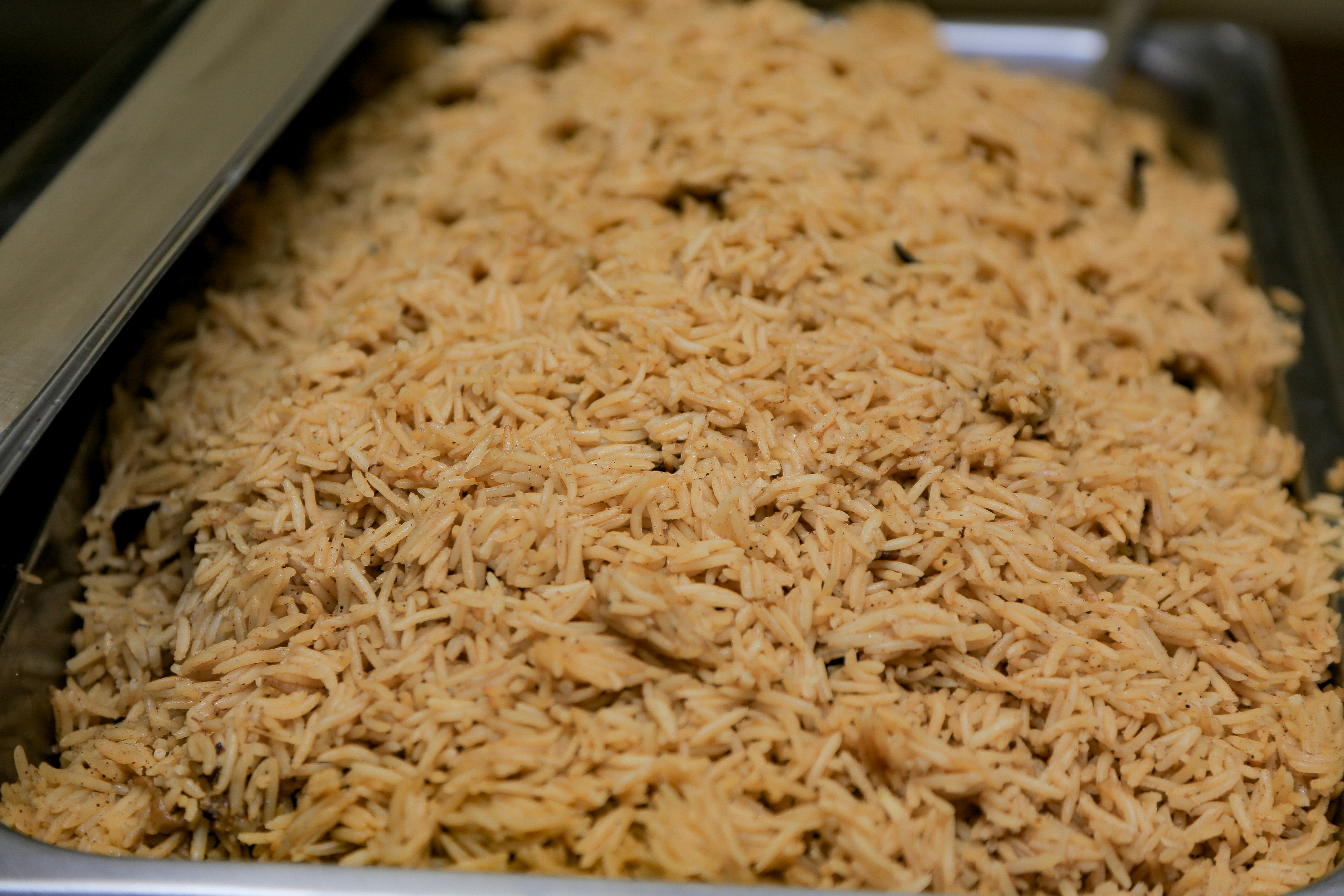 a close up of a tray of rice