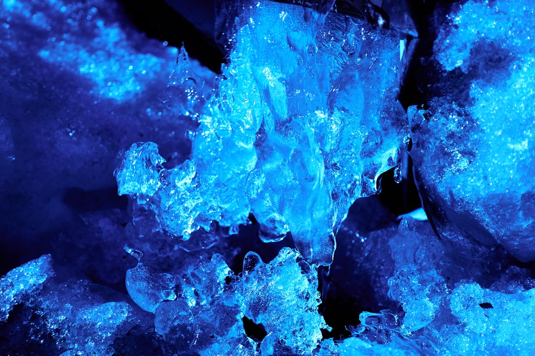 a close up of a blue substance of ice,
