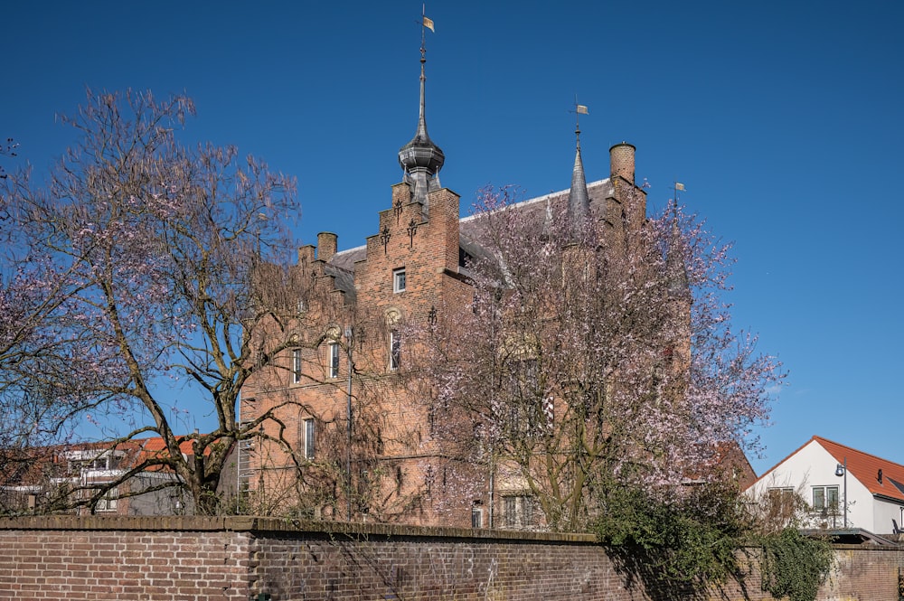 a large brick building with a clock tower