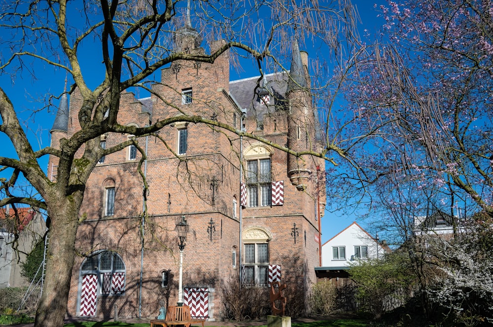 a large brick building with a clock tower