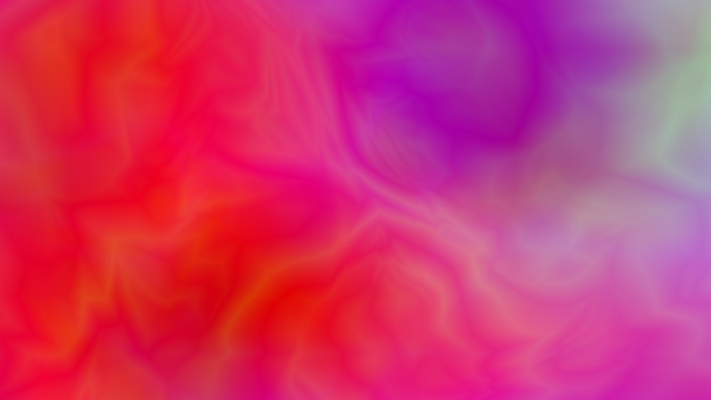 a blurry image of a red and purple background