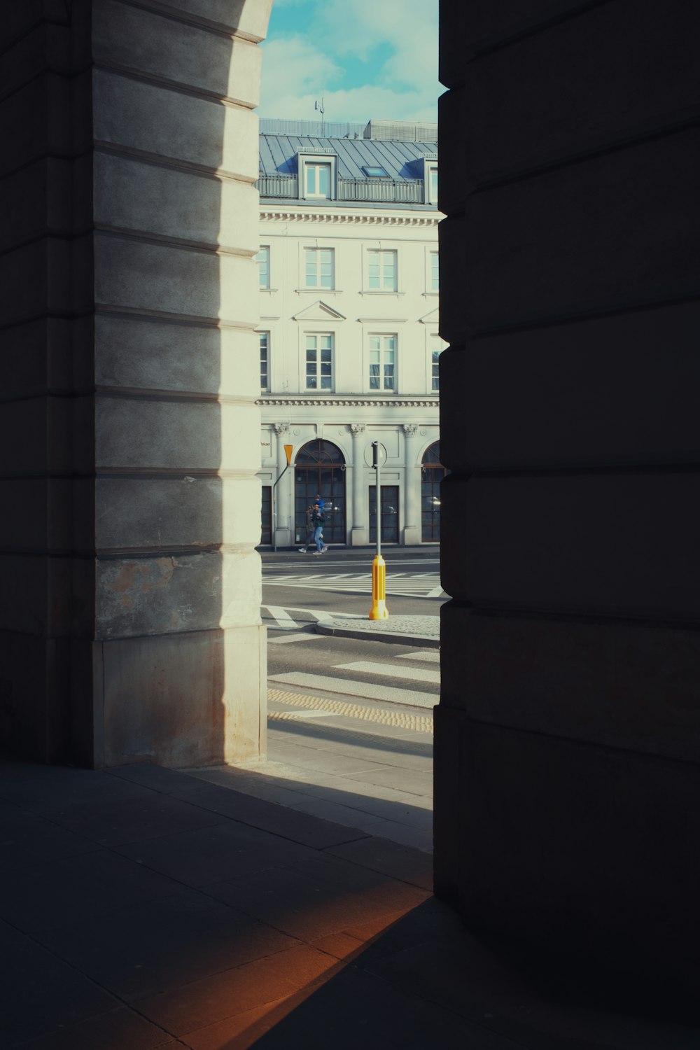 a view of a building through a doorway