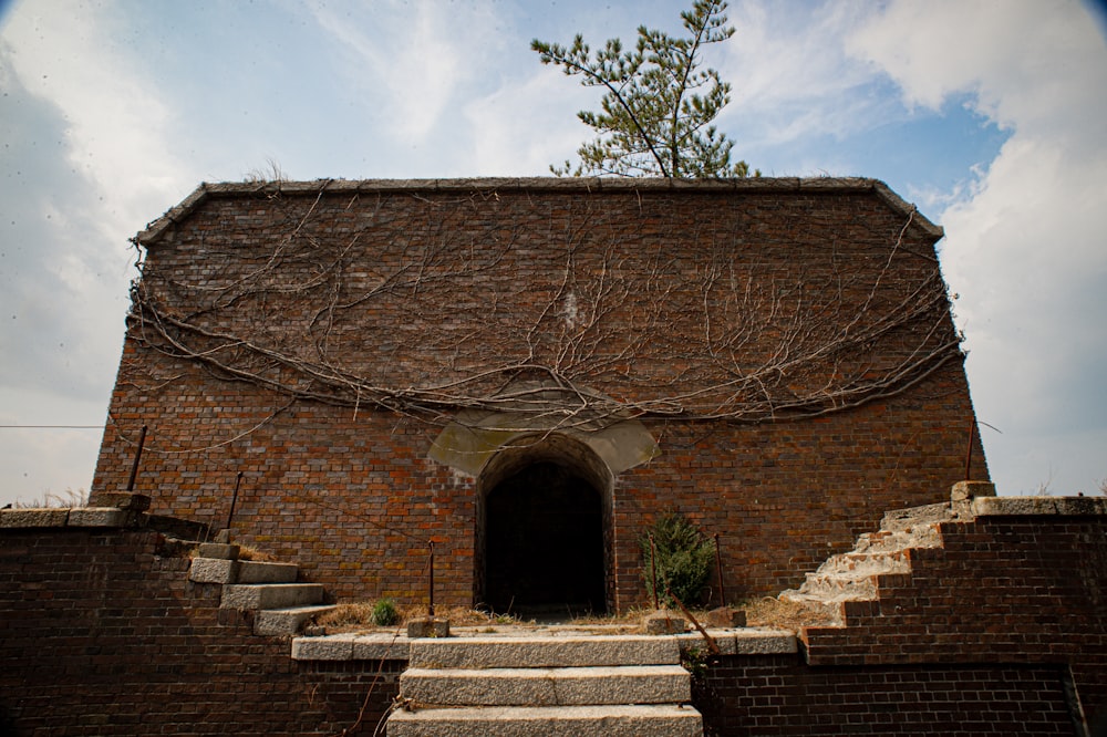 a brick building with steps leading up to it