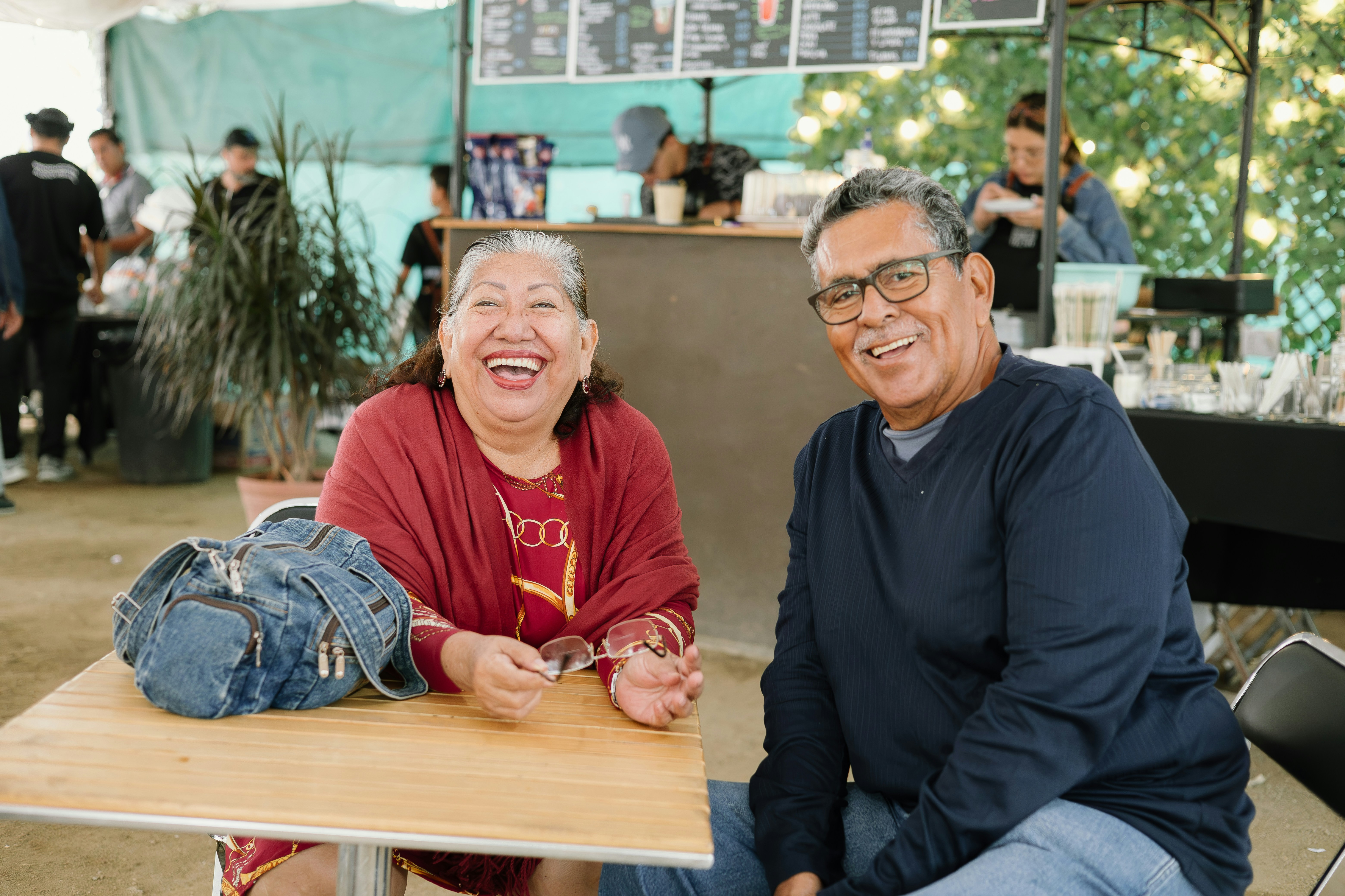 a man and a woman sitting at a table