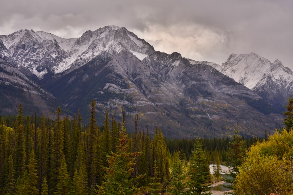 a view of a mountain range with a road in the foreground