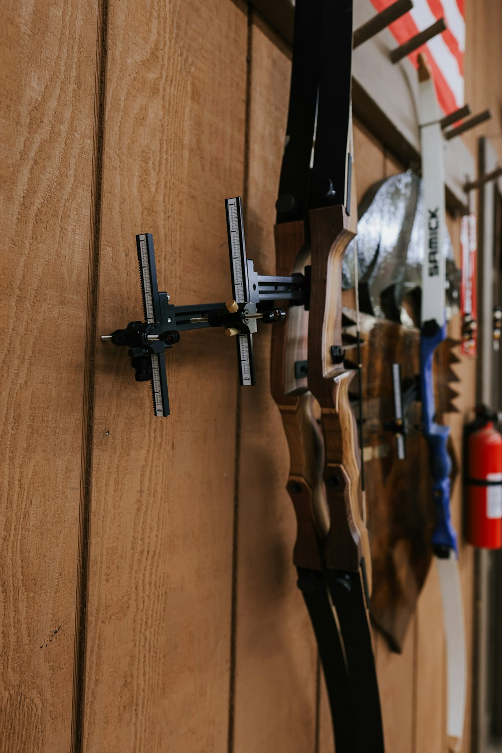 a close up of a wooden door with a metal handle