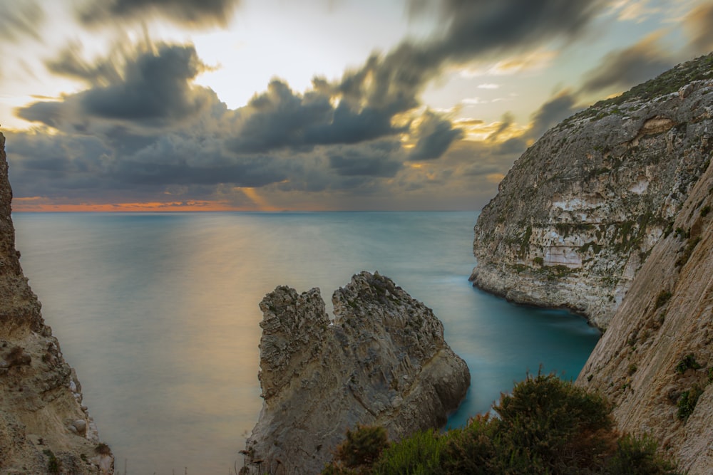 a view of a body of water from a cliff