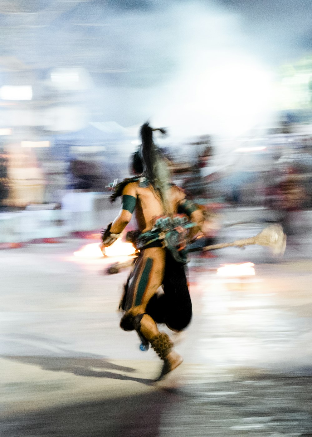 a blurry photo of a man in costume running