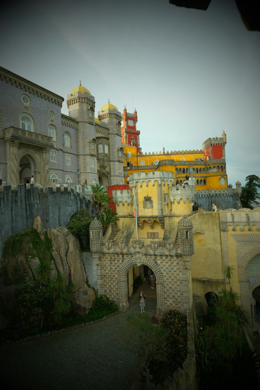 a castle like building with a clock tower on top of it