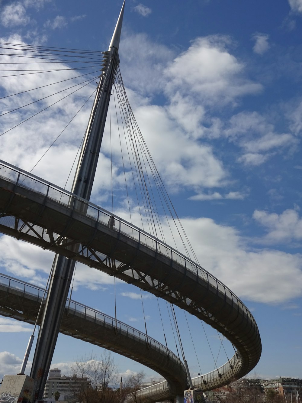 a very tall bridge with a very tall tower